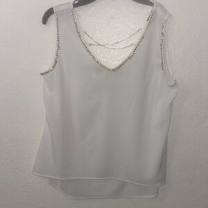 Elegant White Sleeveless Top with Beaded Accents